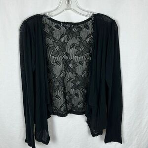 Have brand black open front top with pretty semi-sheer floral back, size L